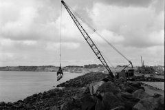 Placing stone on the outside of the K S wharf